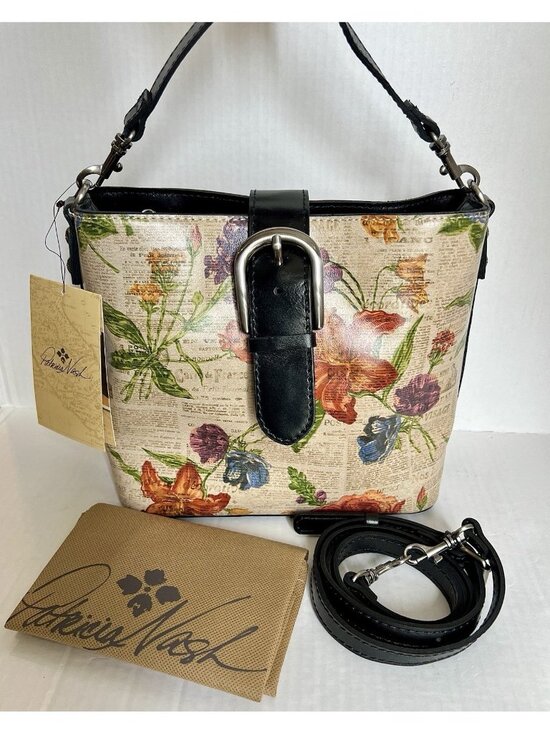 Patricia Nash Handbags - NWT Patricia Nash Irving Bucket Cross Body Parisian Newspaper Floral Bag
